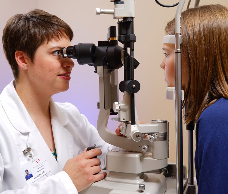Dr. Joy Stone Performs Slit Lamp Examination to Screen for Eye Disease.